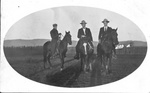 Madera, Chihuahua. Men on horseback.